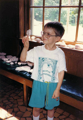 Will (6) showing his clay work at the Creative Earthworks Family Day, 1991.