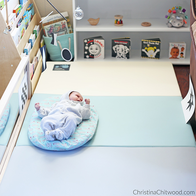 Looking at the Black and White Image in His Montessori Newborn Baby Space Looking at the Black and White Image in His Montessori Newborn Baby Space
