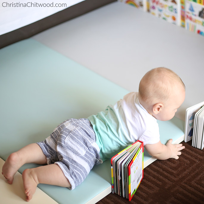 Our Baby Boy Getting a Closer to a Book in His Montessori Space on His Fourth Trip at 5 Months Old